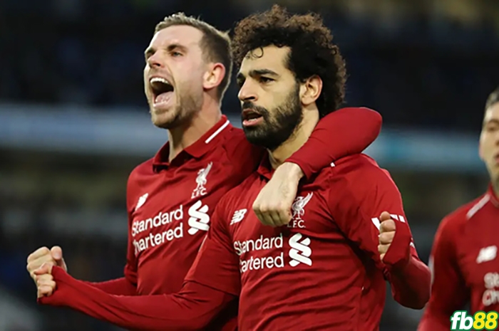 Jordan Henderson và Mohamed Salah